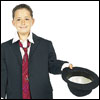 Photo of boy dressed in suit, holding a bowler hat